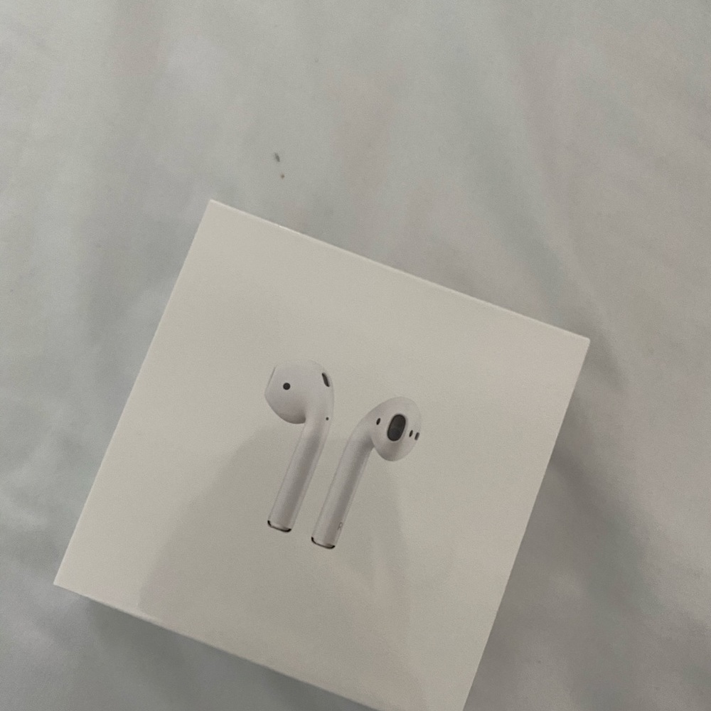 AIRPODS WITH CHARGING CASE -BRAND NEW